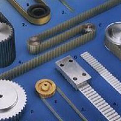 How is the timing pulley driven?